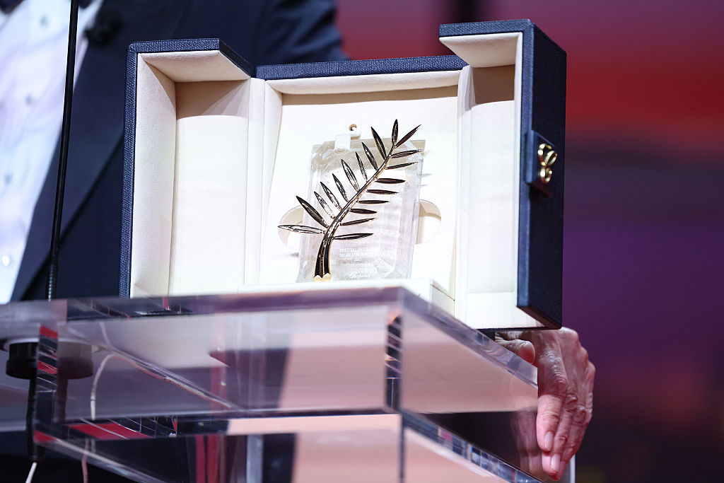 CANNES, FRANCE - MAY 13: Robert De Niro accepts the honorary Palme d'Or onstage during the opening ceremony at the 78th annual Cannes Film Festival at the Palais de Festival on May 13, 2025 in Cannes, France. (Photo by Pascal Le Segretain/Getty Images)